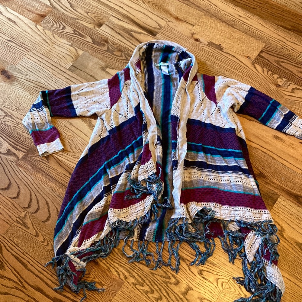 Maurice’s open cardigan